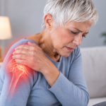 Shoulder pain, woman suffering