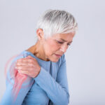shoulder pain, woman in pain